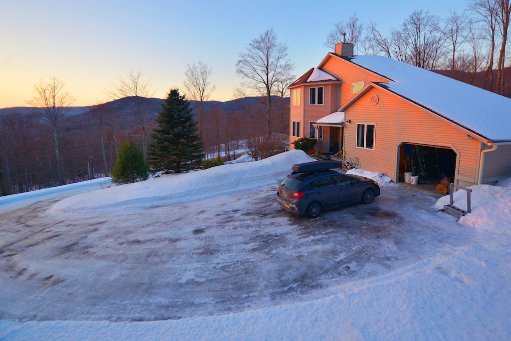 Driveway during sunset. There is level parking lower on the driveway for cars that can't make it all the way up.