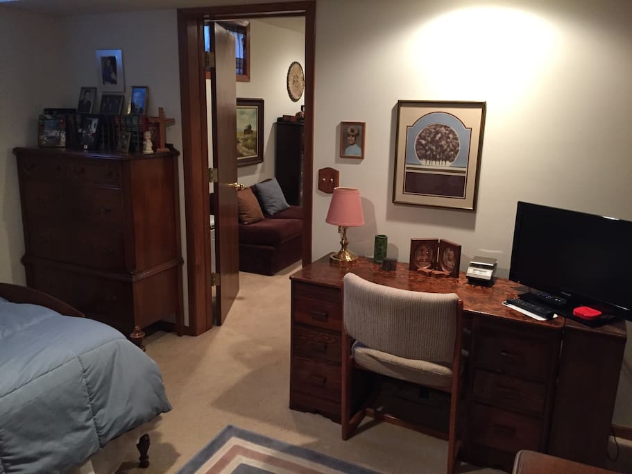 The writing desk in the Lower Level Bedroom with Cable TV & Netflix. Also a tall dresser for organizing clothes for those longer stays!