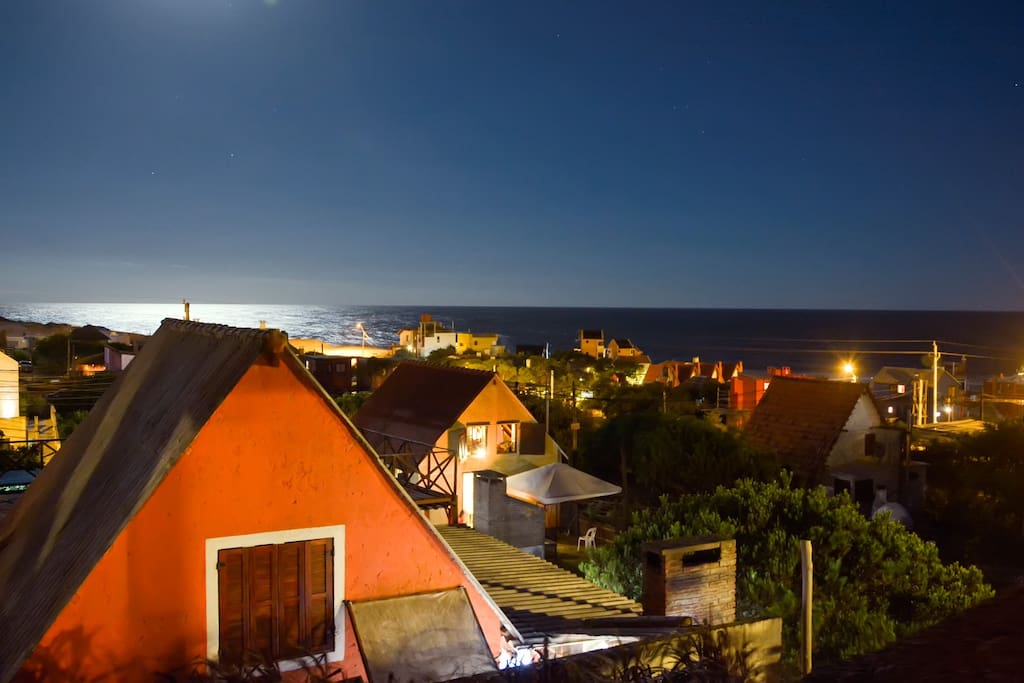 Moon rise over the ocean. View from balcony.