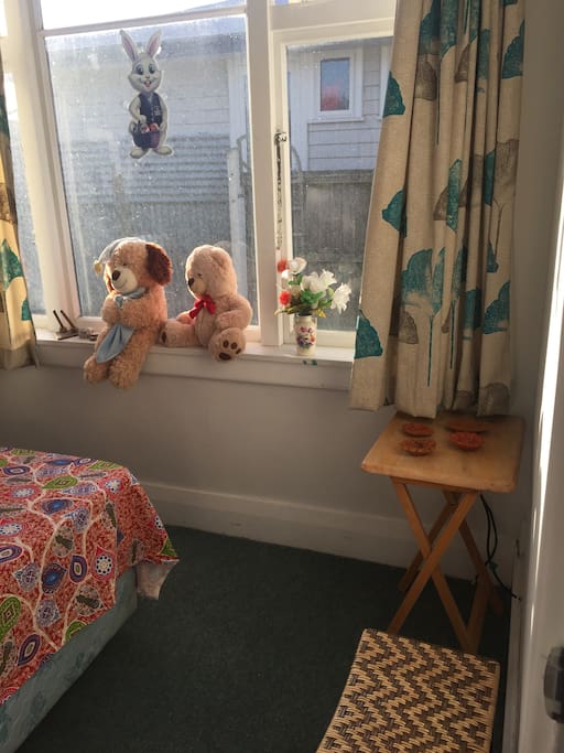 Windows right in front of the bed