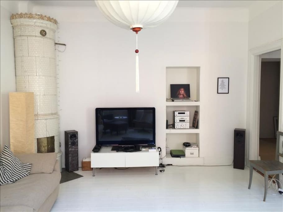 Spacey livingroom with flatscreen TV