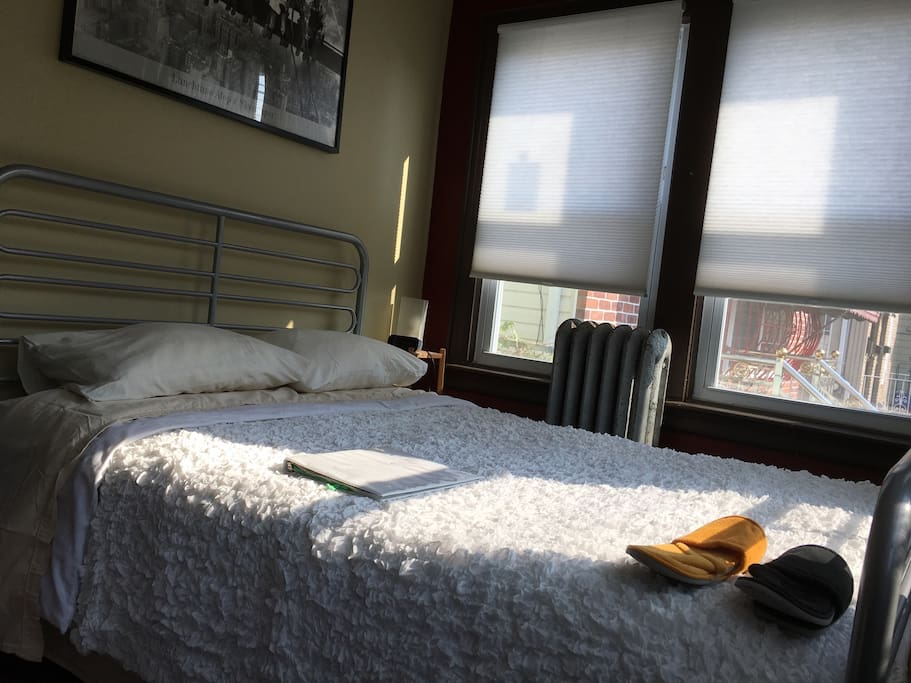 Full size bed with firm mattress and memory foam topper. Slippers are provided for extra comfort when in the house.