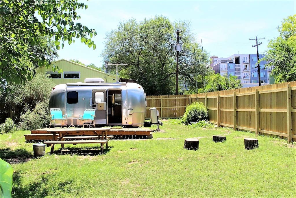 Great deck, picnic table to enjoy meals, and even enough room to pitch a tent!