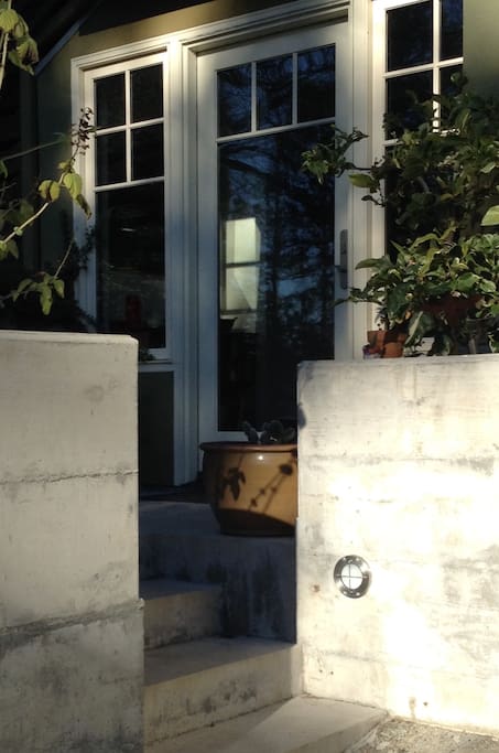 Small, cozy patio off your entrance.