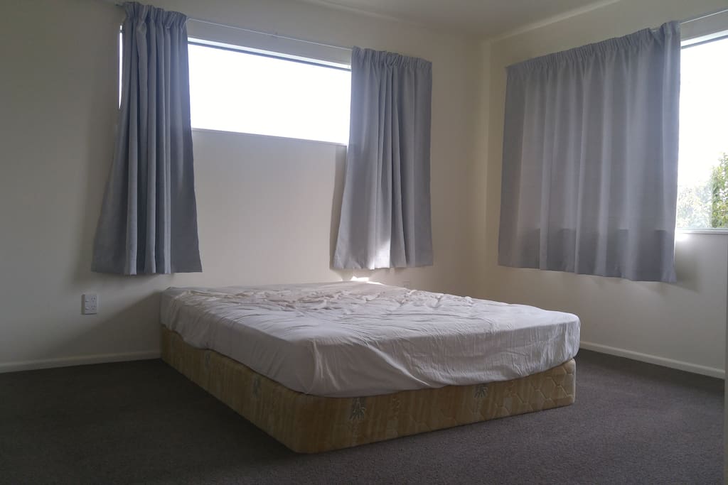 Guest room with Queen bed and open views