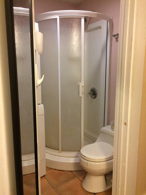 Private bath, with shower, toilet and sink. Towels included.
