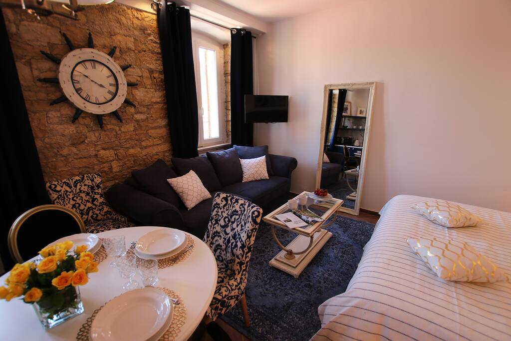 Cozy sitting area with large sofa and big comfortable pillows