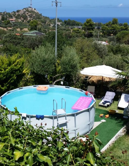 View from 1st floor, garden with the pool