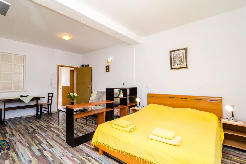 Room and living area equipped with SAT TV set