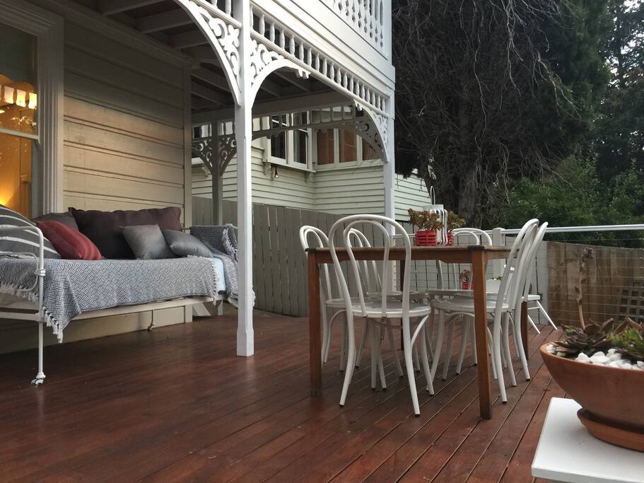 Relax on the day bed and enjoy the garden views