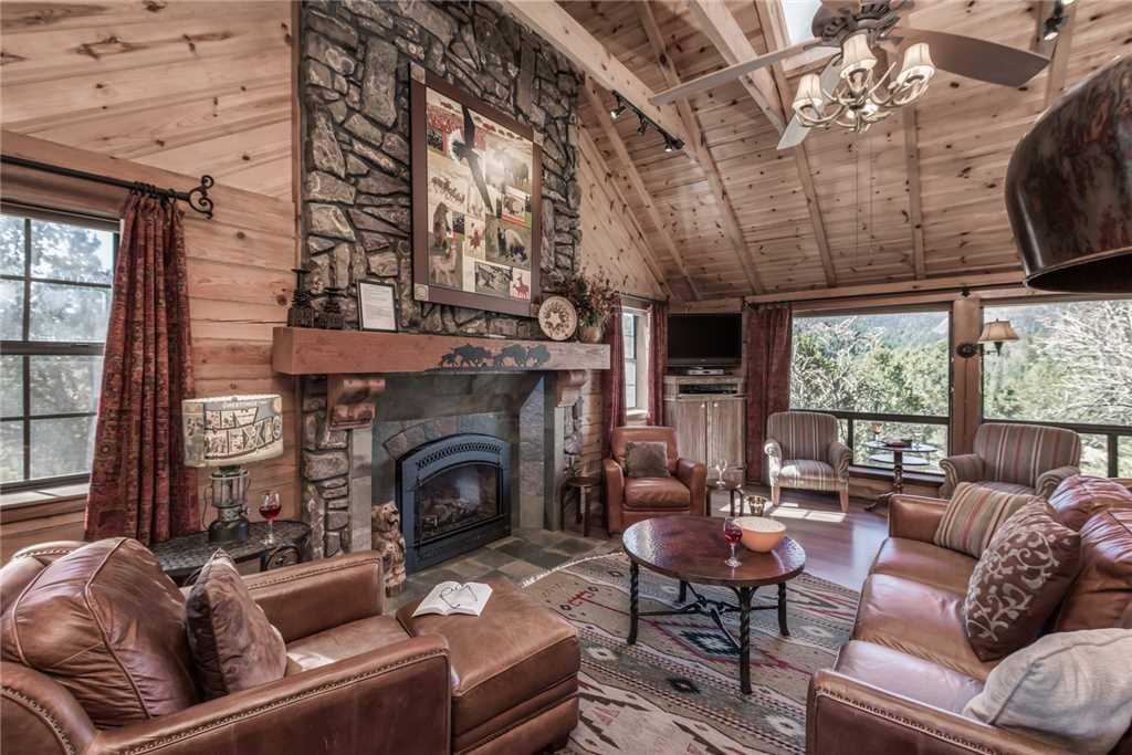 Living Room - Watch a little TV, plan your day’s activities, or take in the beautiful views of nature. Just sink into the sofa an