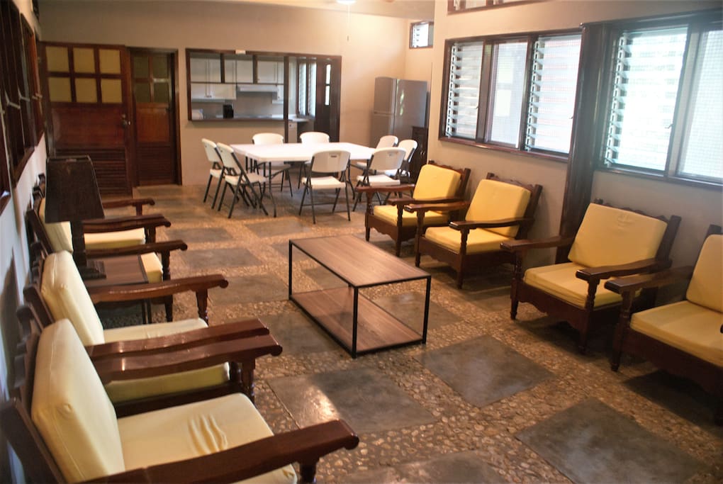 The spacious Family Room integrated with dining table and kitchenette. Half Bathroom available in this section.