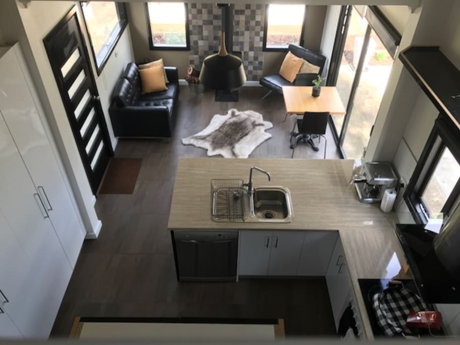 View of kitchen and sitting room from upstairs bathroom.