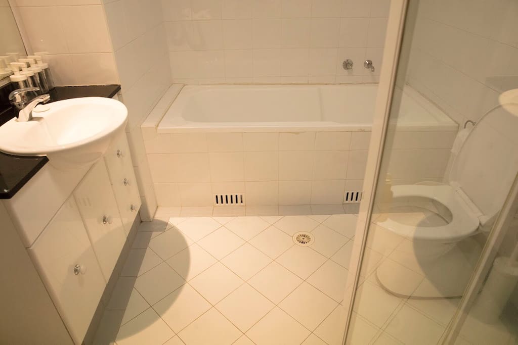 Bathroom with shower room and tub. Relax yourself there.