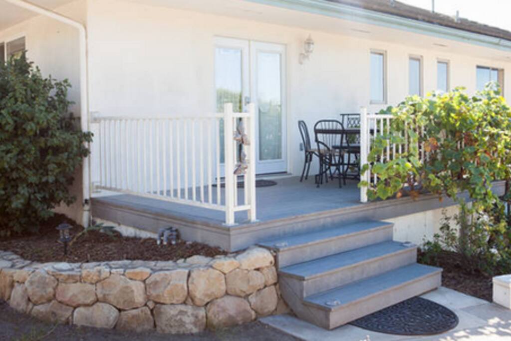 Private entrance to your listing (Bumblebees on the railing)