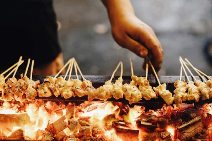 Satay being grilled