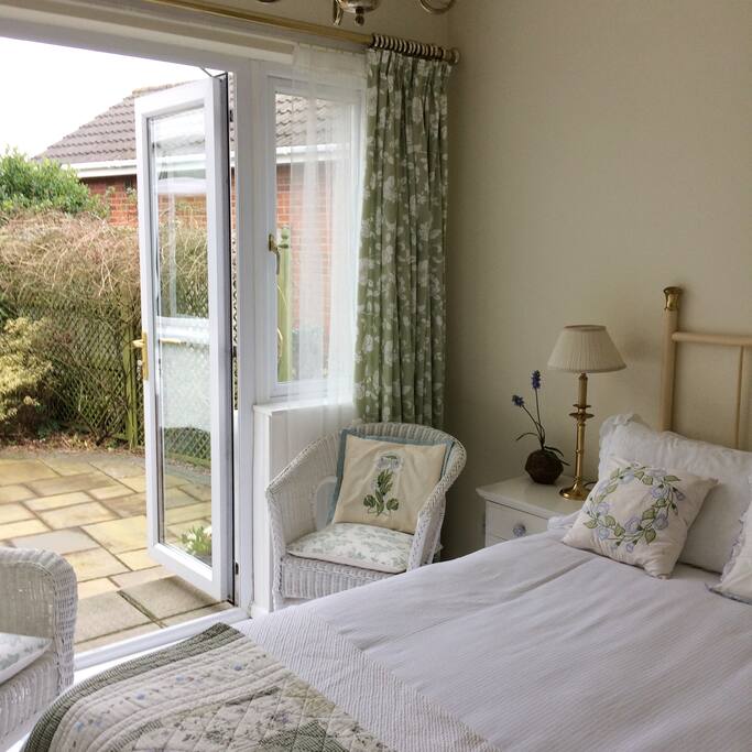 French doors to private outdoor seating area
