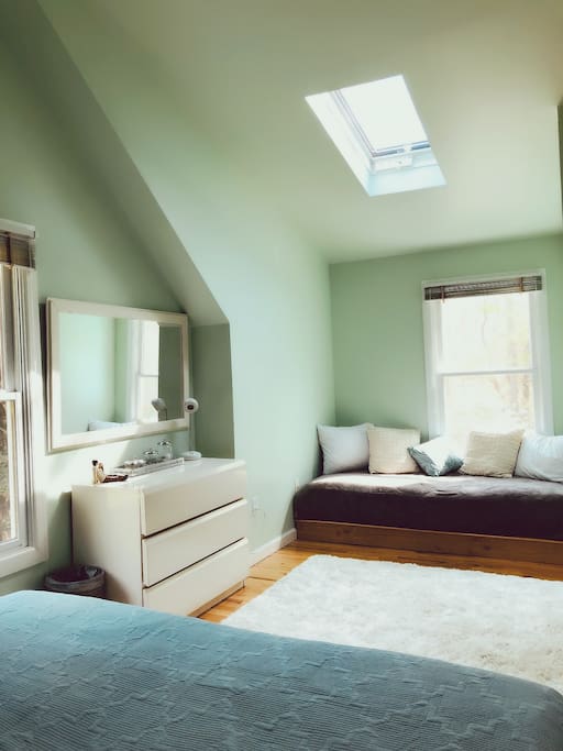 mirror and dresser with comfortable day bed