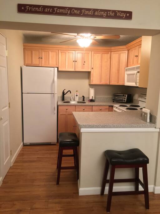 Fully stocked kitchen with Kuerig coffee maker