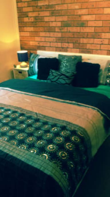 Guestroom, with a queen size bed, Inbuilt mirror wardrobe, With a 32cm flat screen television with pay TV