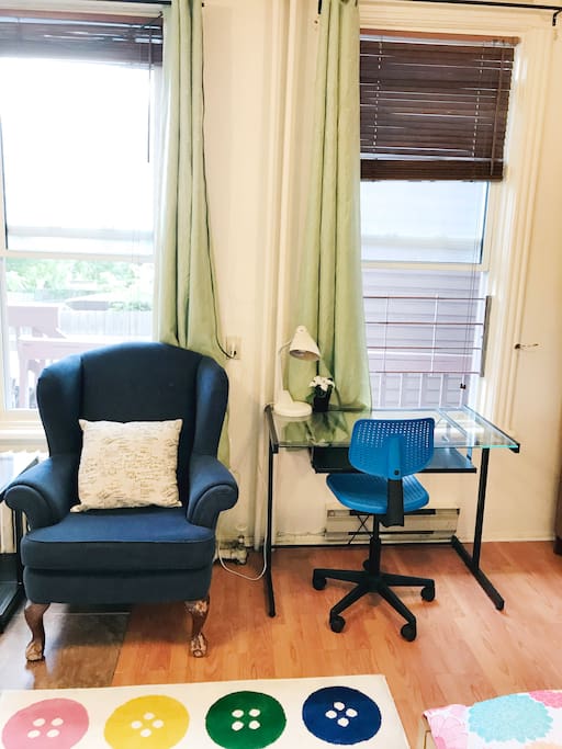 Comes with a desk and chair to get work done, and an armchair couch to relax in!