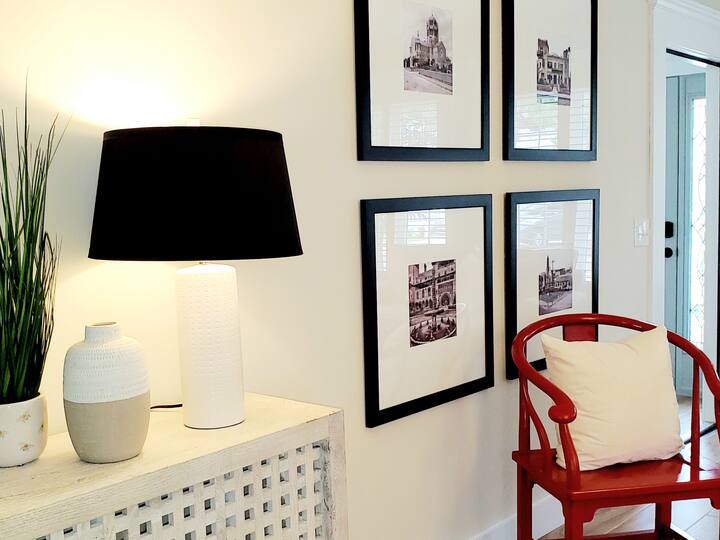 Stylish Serena and Lily Furniture with Framed St Augustine Vintage Photos.  
