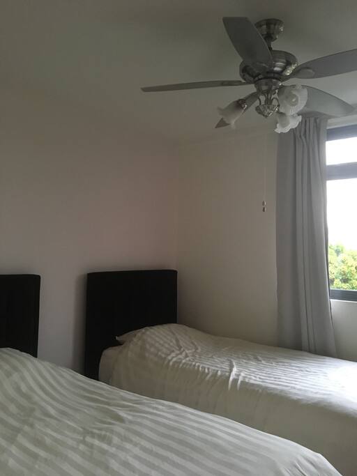 2 single beds with adjustable fan and lightings