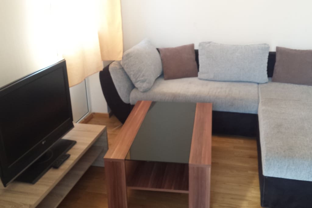 living room, sleeping sofa, kitchen
