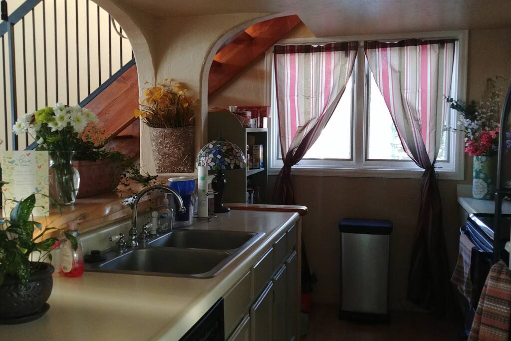 Kitchen. Staircase in background.