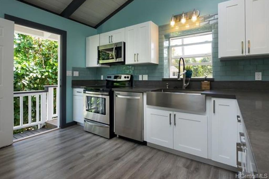 Kitchen with high end appliances throughout.