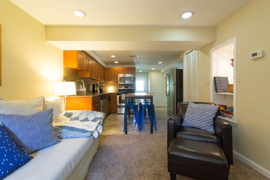 Living room, kitchen, and back door.