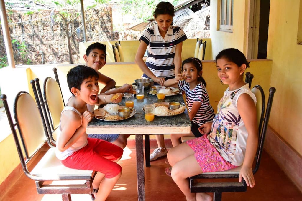 A family enjoying lunch.