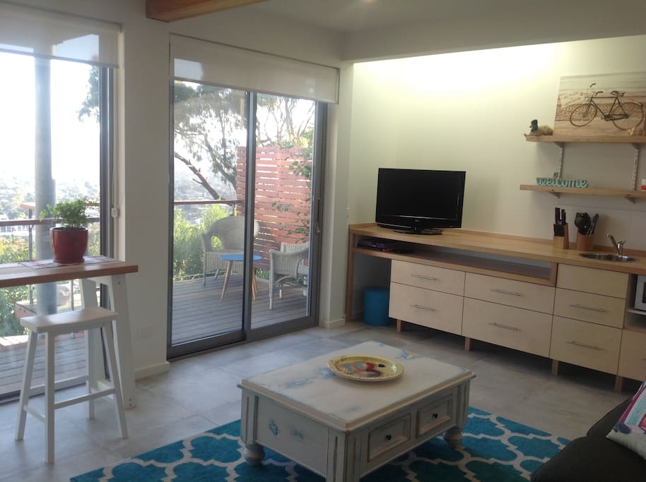 The living area leading out to the deck