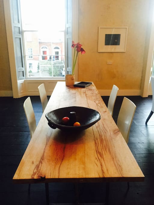 Comfortable dining for ten on custom made spalted beech dining table
