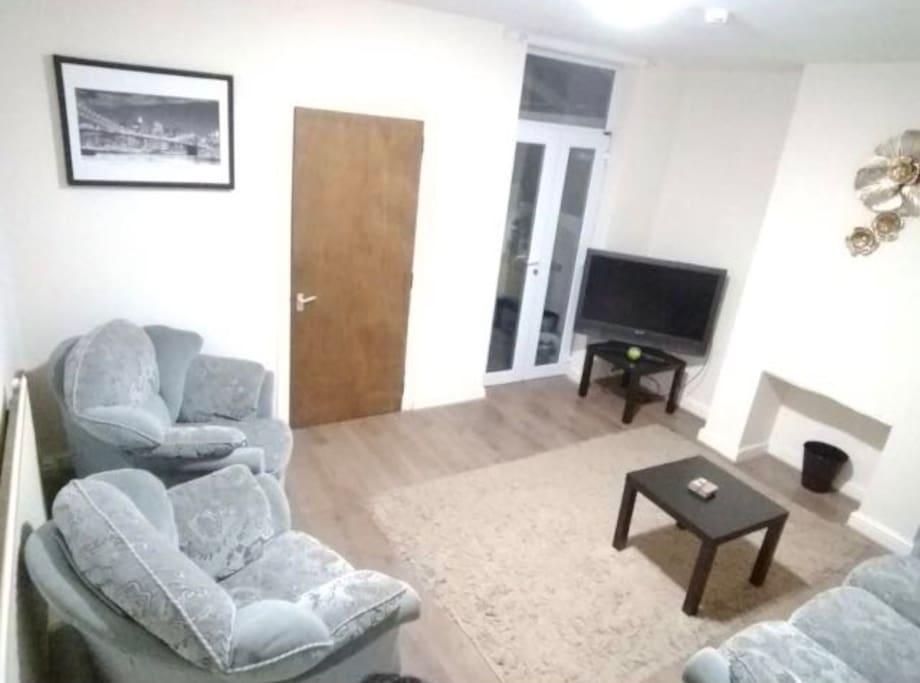 Comfortable large lounge with sofas & TV.
Also has extra electrical points so guests can work from here or own room