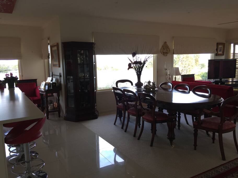 The family room has river views and opens on to a large balcony.