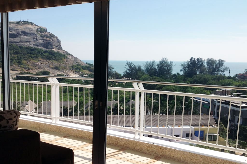 The large porch offers beautiful mountain and sea views. There is access from the living room and bedroom.