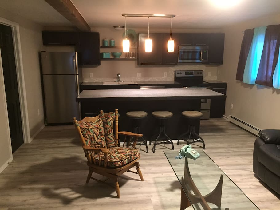 The Island is 8 feet long, so there is plenty of work space in the kitchen.