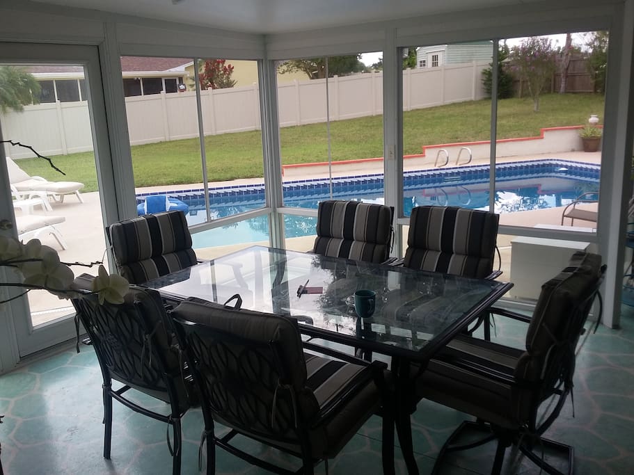 large screened-in patio area + big swimming pool