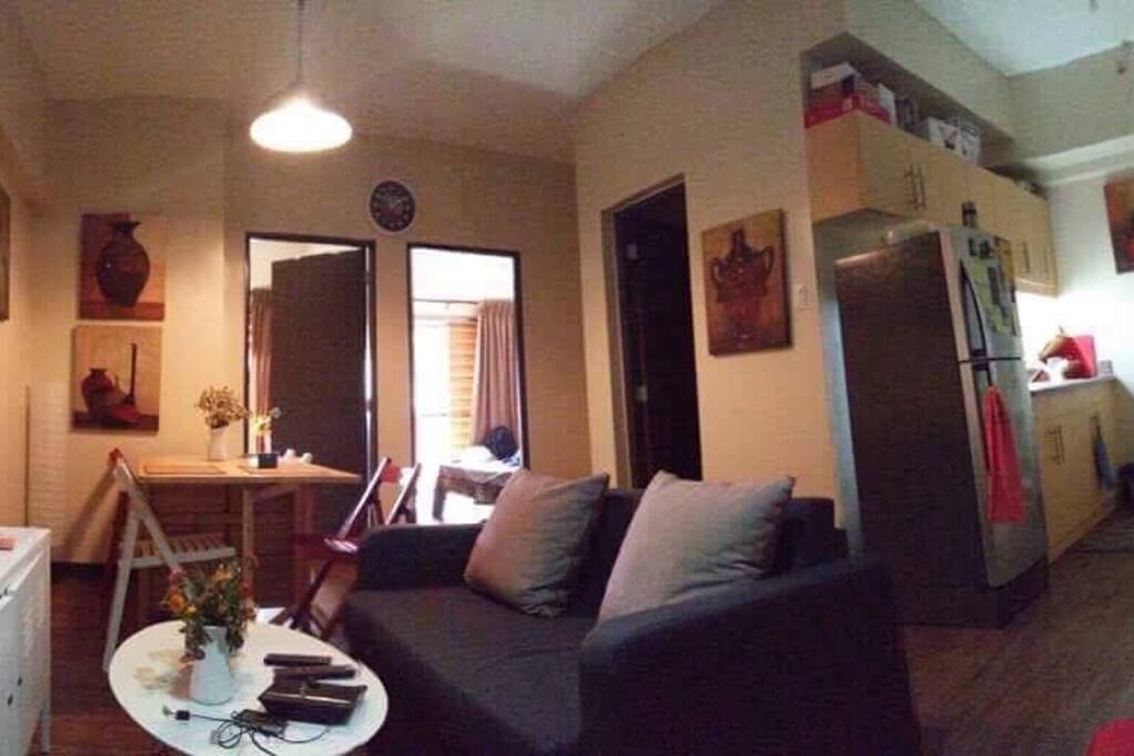 Living area has TV, internet/wifi and landline phone with an IKEA sofa bed that can sleep 1-2 persons. Kitchen is furnished with a fridge, microwave oven, rice cooker, kettle, pans, oven toaster and cutlery. First 5 liters of drinking water is provided for free.