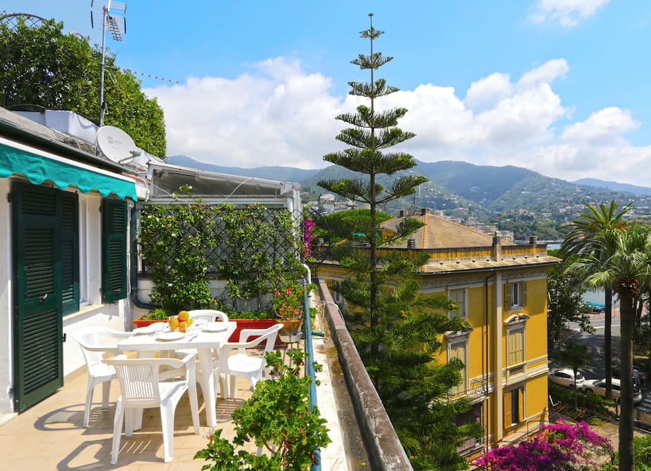 Big terrace with solarium and table for outdoor dining