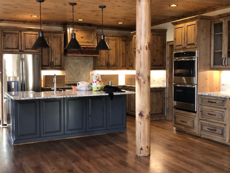 This spacious kitchen has a layout planned for visitors.