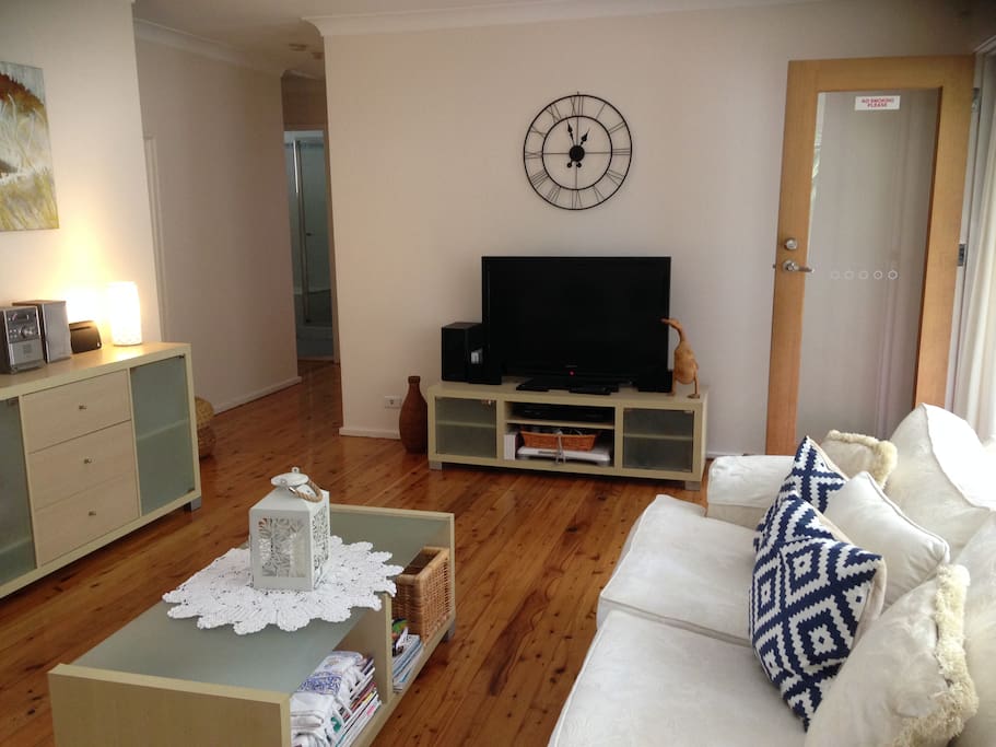Lounge Room with TV, Blue-Ray DVD, Surround Sound, Wii & selection on DVD's.