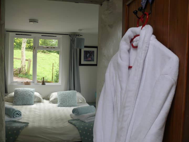 Dressing gowns are provided for guests, when using the hot tub. The second bedroom can be either 2 singles or one large double, or even one single and a cot.