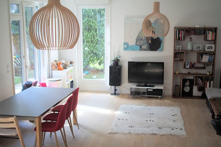 Family duplex with private garden near town center