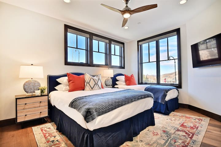 Enjoy this 4th bedroom with a queen plus a bonus twin bed. Perfect for kids or a young family. This room also has an ensuite bathroom with walk-in shower.