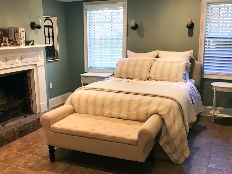 Primary bedroom with queen sized bed with luxury linens and silky-soft eucalyptus sheets. Room includes a desk in case a bit of work needs to done.