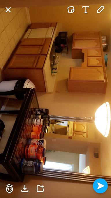 Kitchen is open to the dining room area (will have a table this week) and has a window looking into the living room.