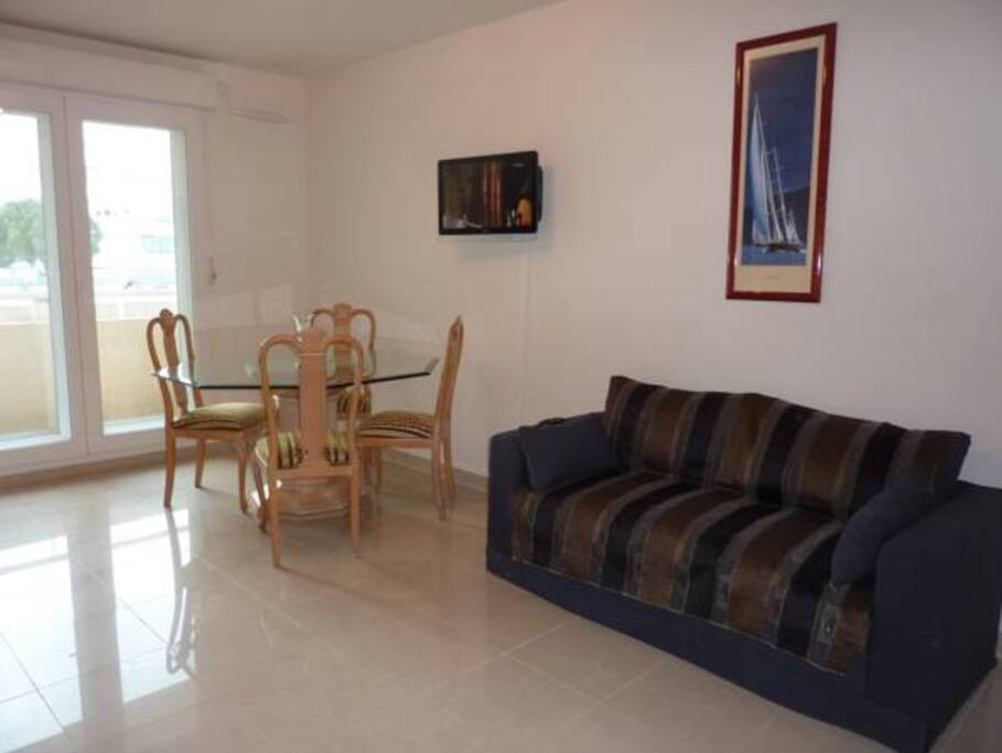 Living with convertible sofa, balcony