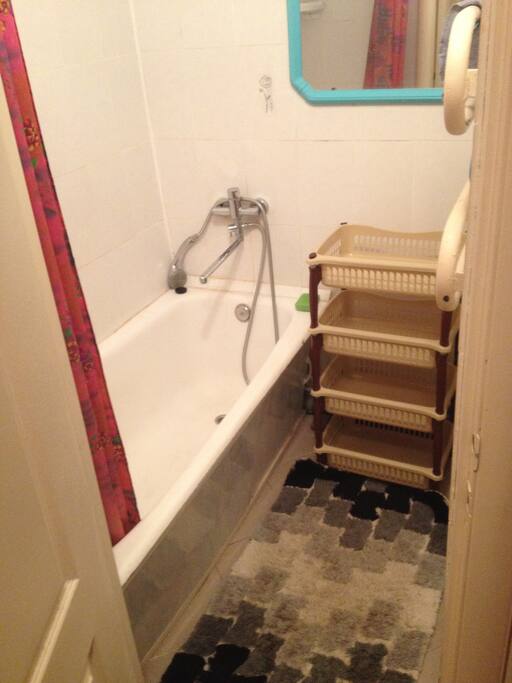 The bathroom is separate from the toilet